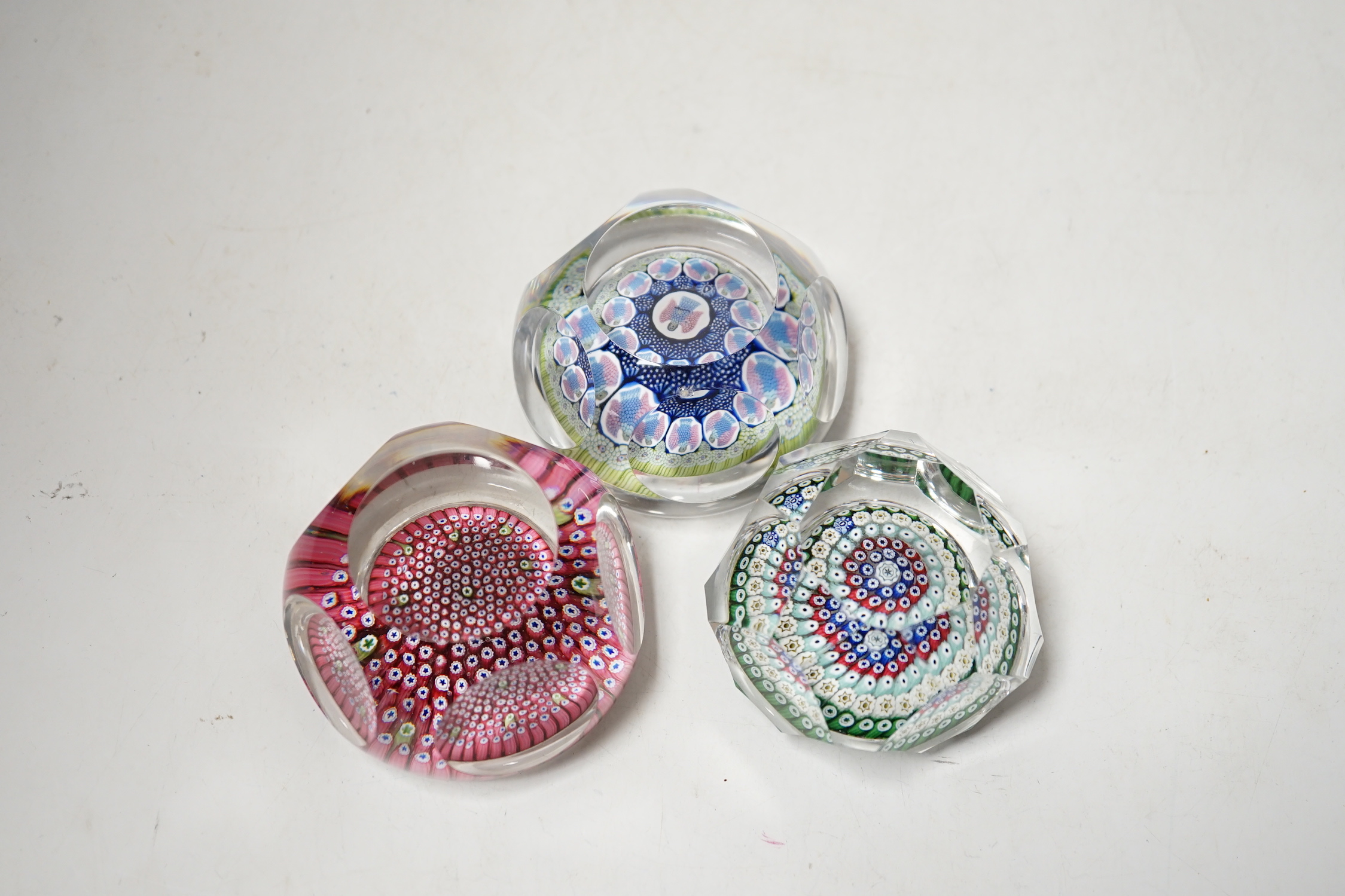Three Whitefriars faceted millefiori glass paperweights, 8cm in diameter